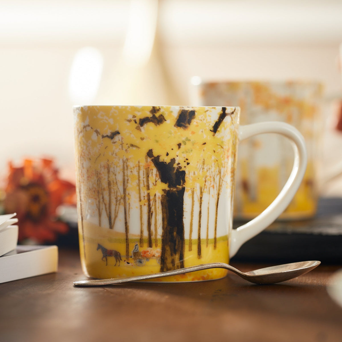 A close shot of the horse and carriage detail on one of the Caskata X Felix Dolittle Autumn Collaboration Porcelain Mug Set of 4