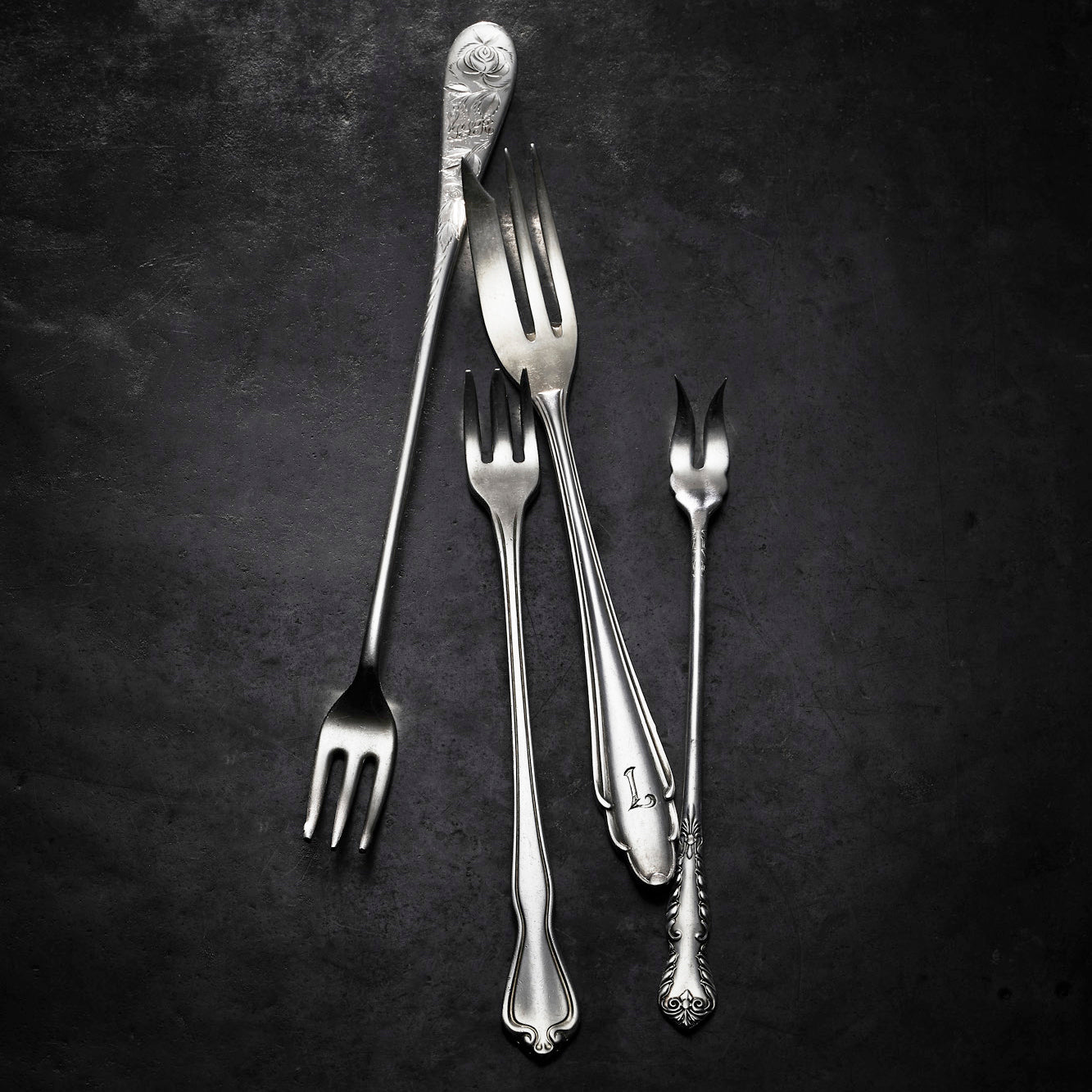 Vintage, silver-plated cocktail forks collected and restored by Caskata.