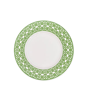 A Newport Garden Gate Verde Rimmed Salad Plate by Caskata Artisanal Home, featuring a detailed green patterned border, embodies contemporary tableware design reminiscent of Newport Garden Gate.