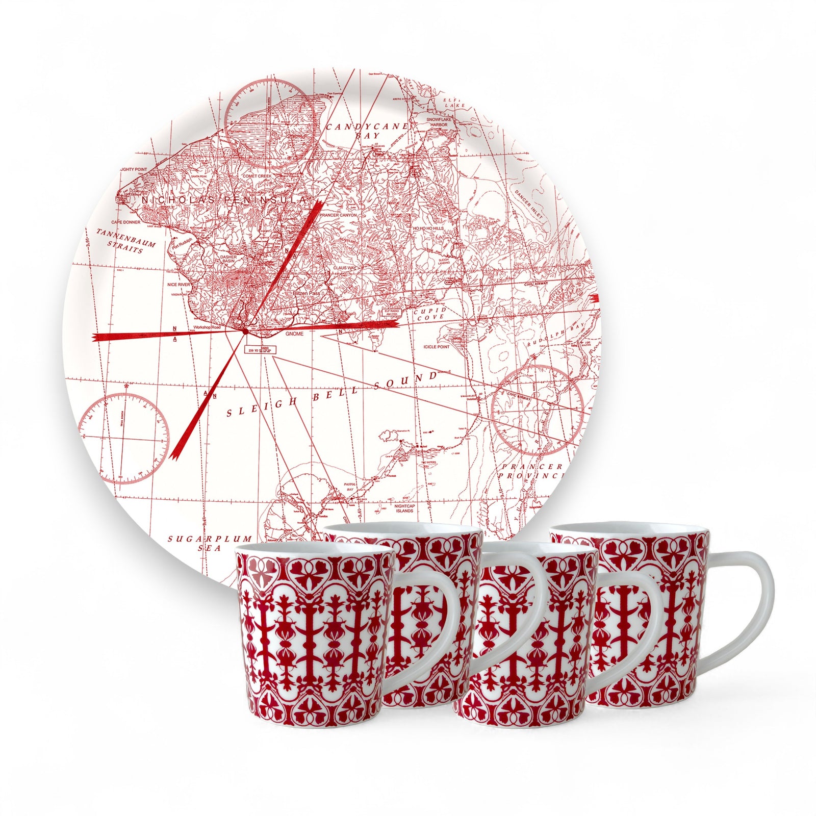 The Caskata "Holiday Cocoa" Bundle features four white porcelain mugs with red geometric patterns, placed in front of a birchwood serving tray adorned with a red vintage map design, all set against a white background.