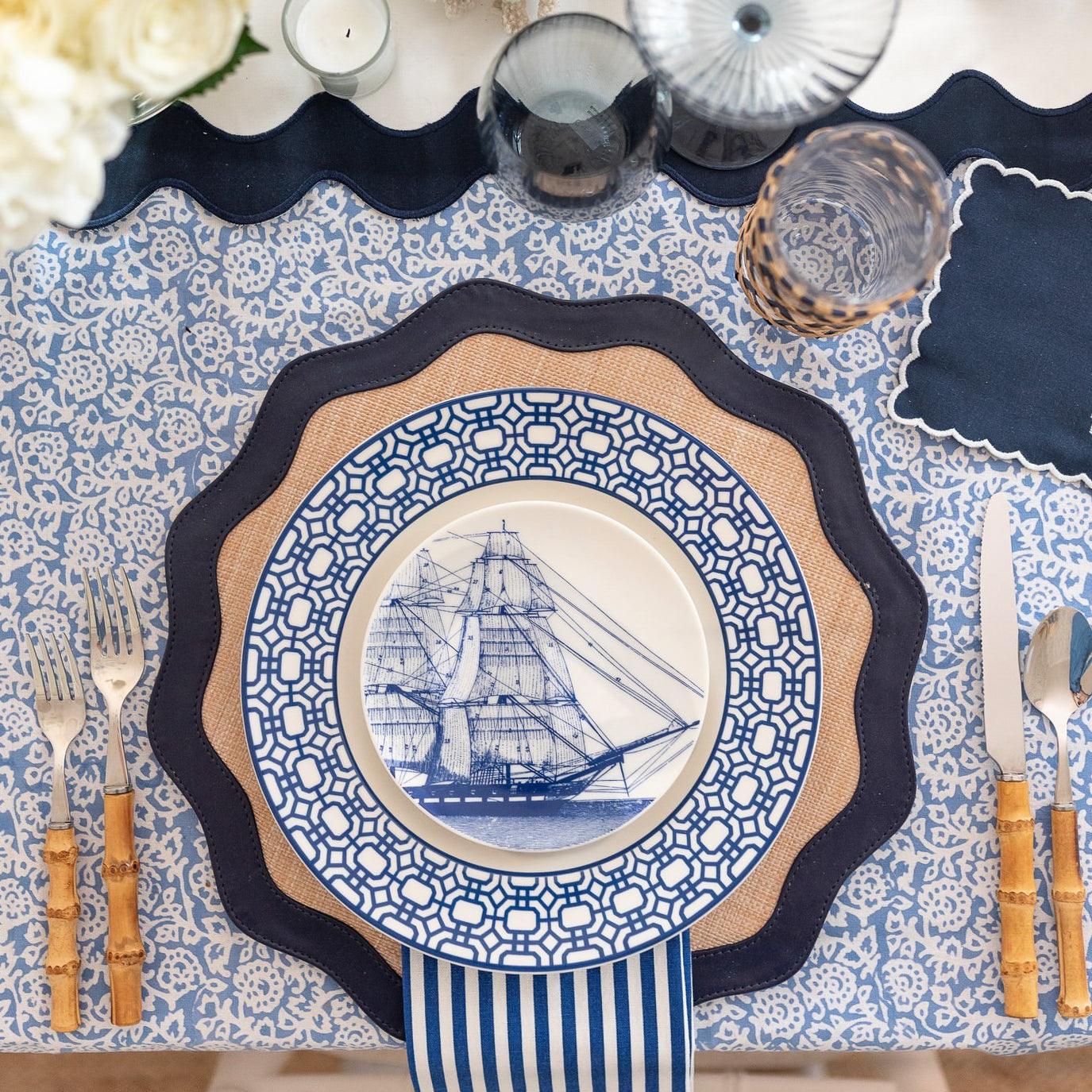 Rigging plates in blue and white porcelain on this small plate set of 4 from Caskata showing intricate rigging on antique sailing ships-  different ships