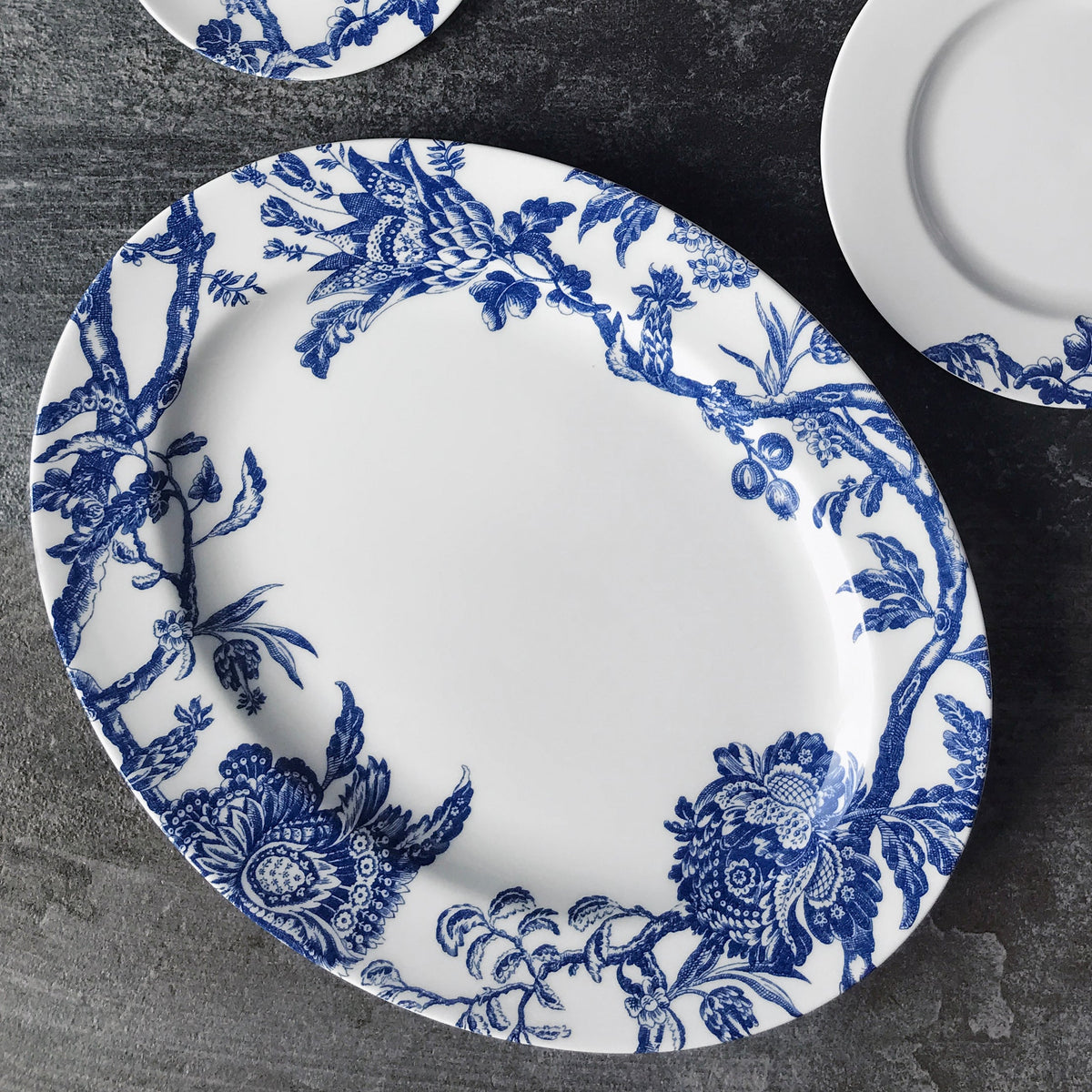 The blue and white porcelain Arcadia Large Oval Rimmed Platter - Caskata