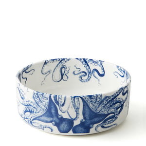 The Caskata Pampered Pet Bundle features a round white porcelain bowl with detailed blue octopus illustrations—an eye-catching, decorative bowl ideal for medium pets.