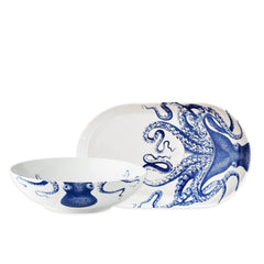 The Caskata Lucy the Octopus Serving Set features a white ceramic bowl with an octopus head and a porcelain platter showing the full creature—charming blue illustrations make it a unique housewarming gift.