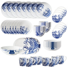 The Caskata Lucy Ultimate Set is a 45-piece porcelain dinnerware collection with blue and white octopus designs on plates, bowls, mugs, and serving dishes, all beautifully arranged on a white background.