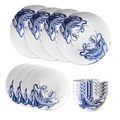 The Caskata Lucy Table for 4 set features premium porcelain plates and bowls with blue octopus illustrations, creating a striking blue and white display that's perfect for your table.