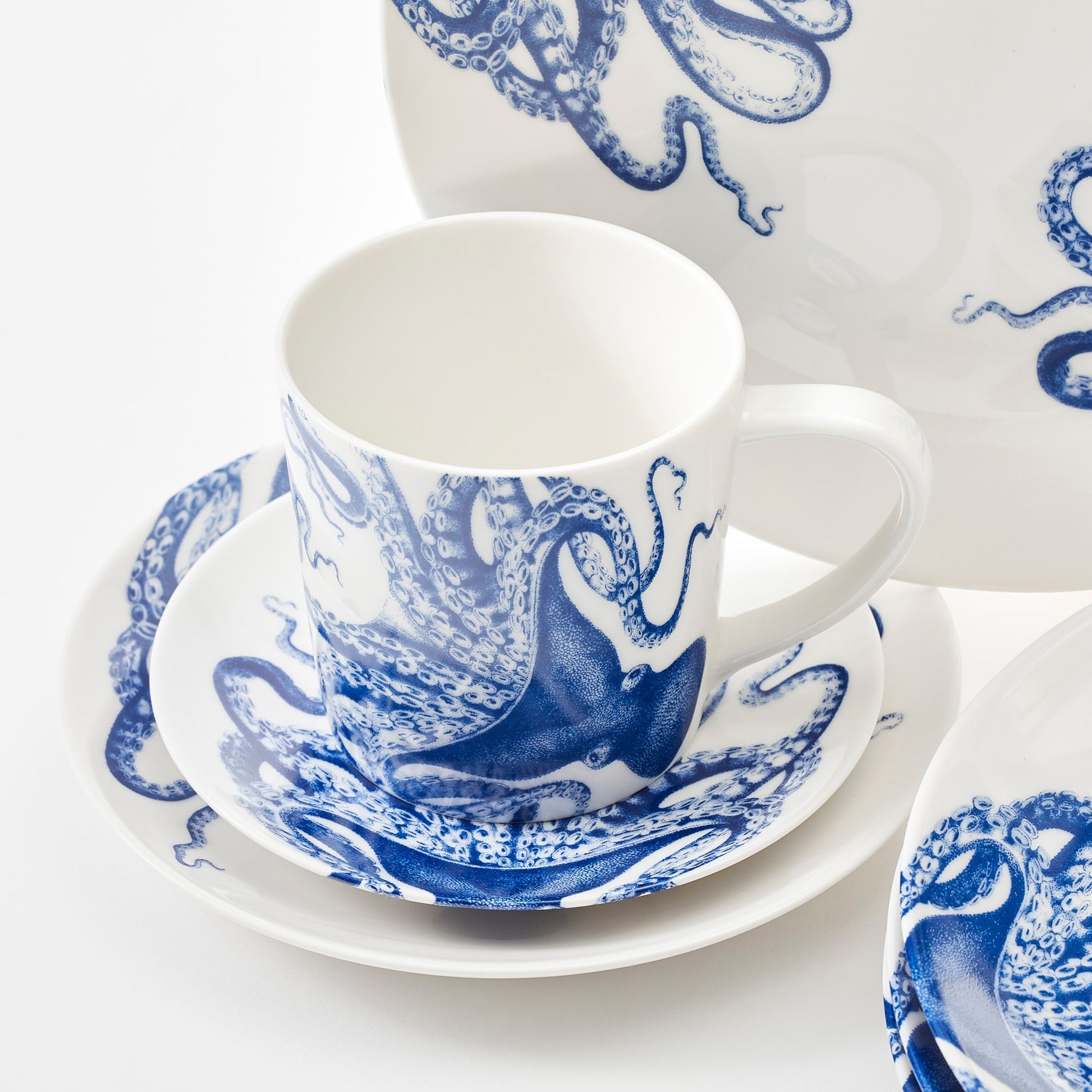 Lucy Table for 4 by Caskata blue and white porcelain dinnerware set.