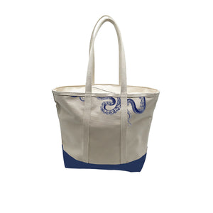 Caskata Lucy the Octopus Canvas Tote bag back side showing tentacles in silhouette with 4 pockets inside and 2 outside. Made in the USA.