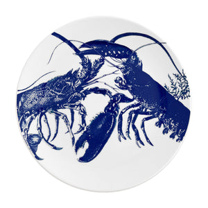 Caskata lobster dinner plate in blue on creamy white porcelain. Dishwasher safe.