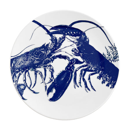 Caskata lobster dinner plate in blue on creamy white porcelain. Dishwasher safe.