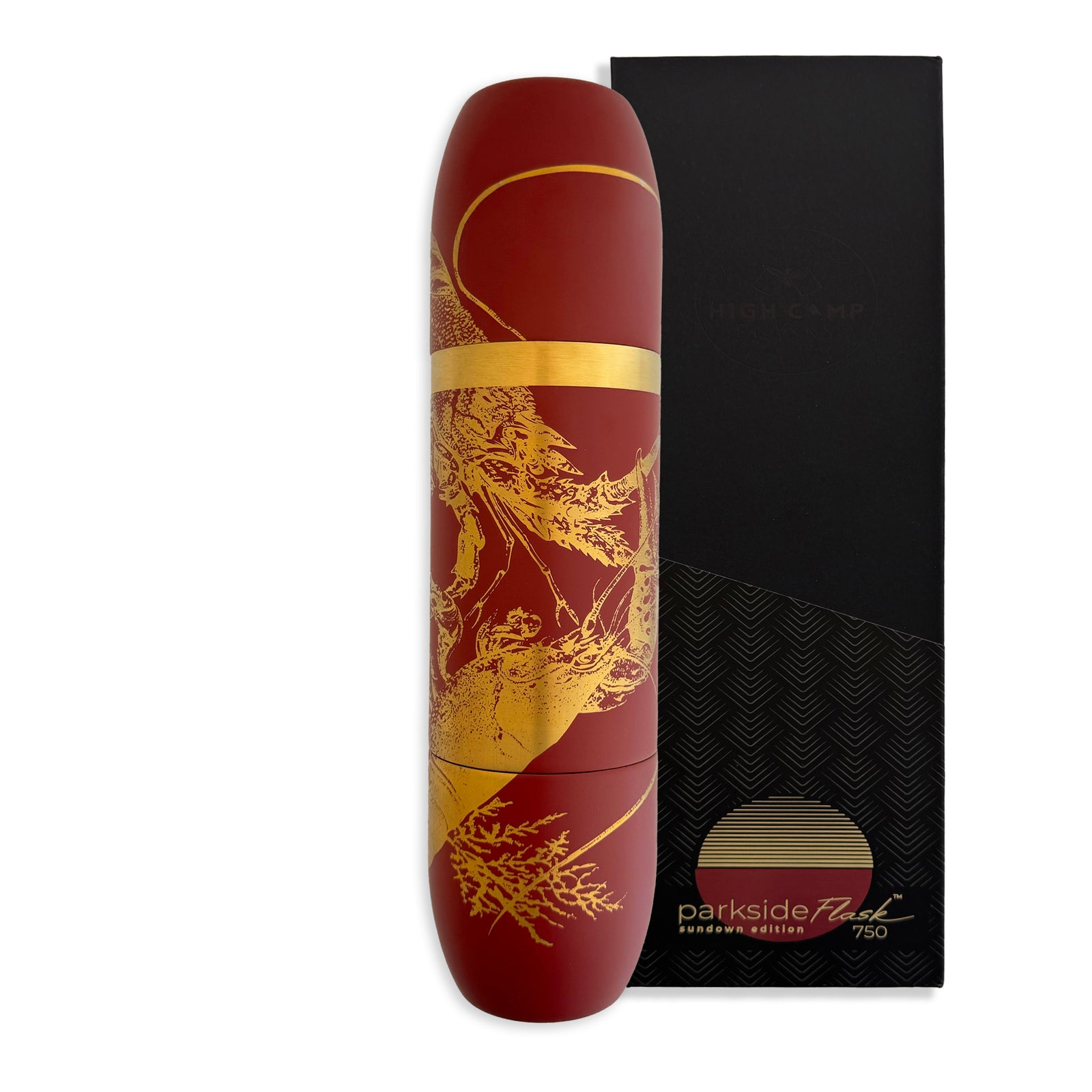 A maroon and gold insulated wine flask with a lobster motif, shown beside its black and gold box labeled "Caskata x High Camp Red Lobster Parkside Flask" by Caskata.