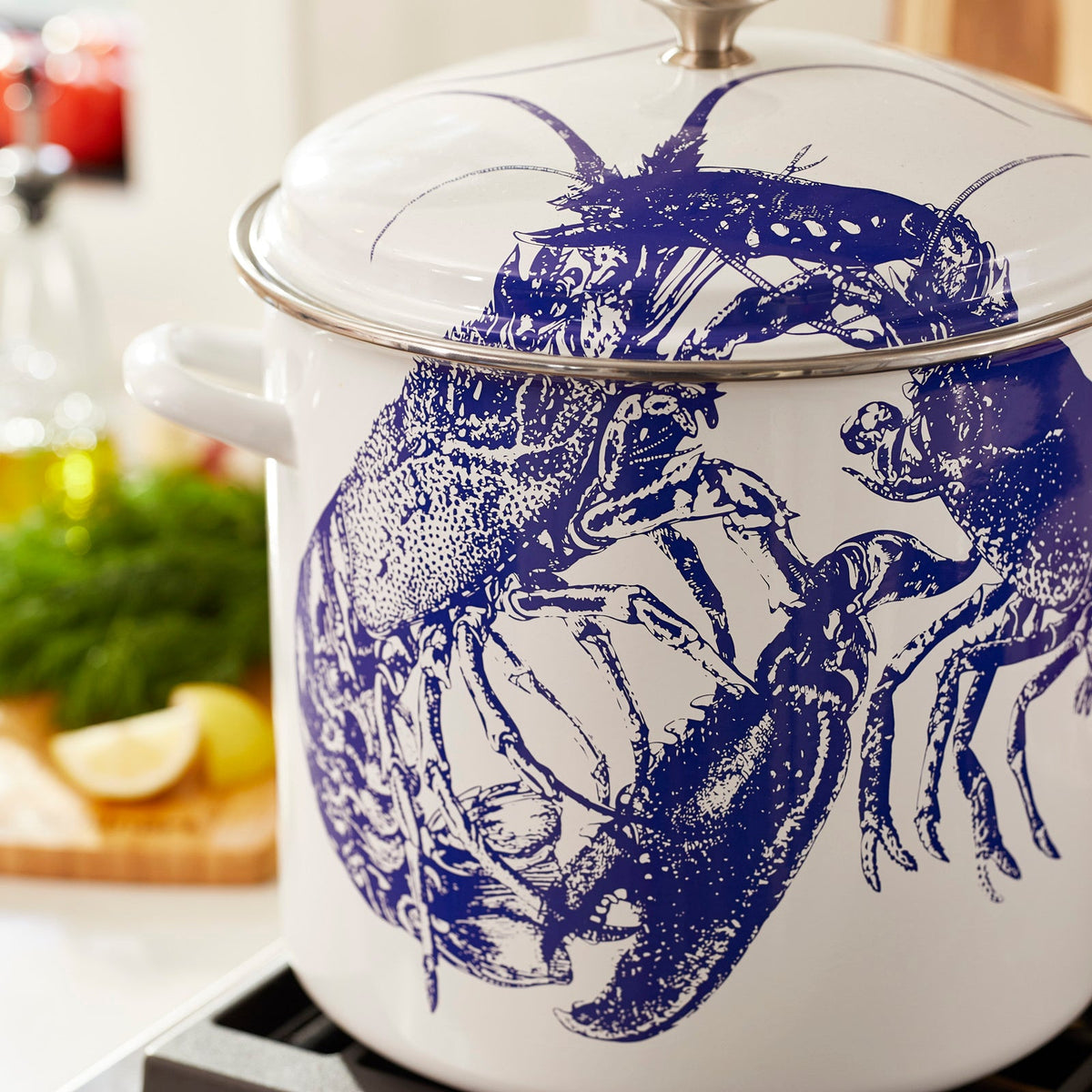 A blue and white Caskata X Cuisinart Limited Edition Lobster 16 Qt. Enamel on Steel Stockpot, perfect for clambakes.