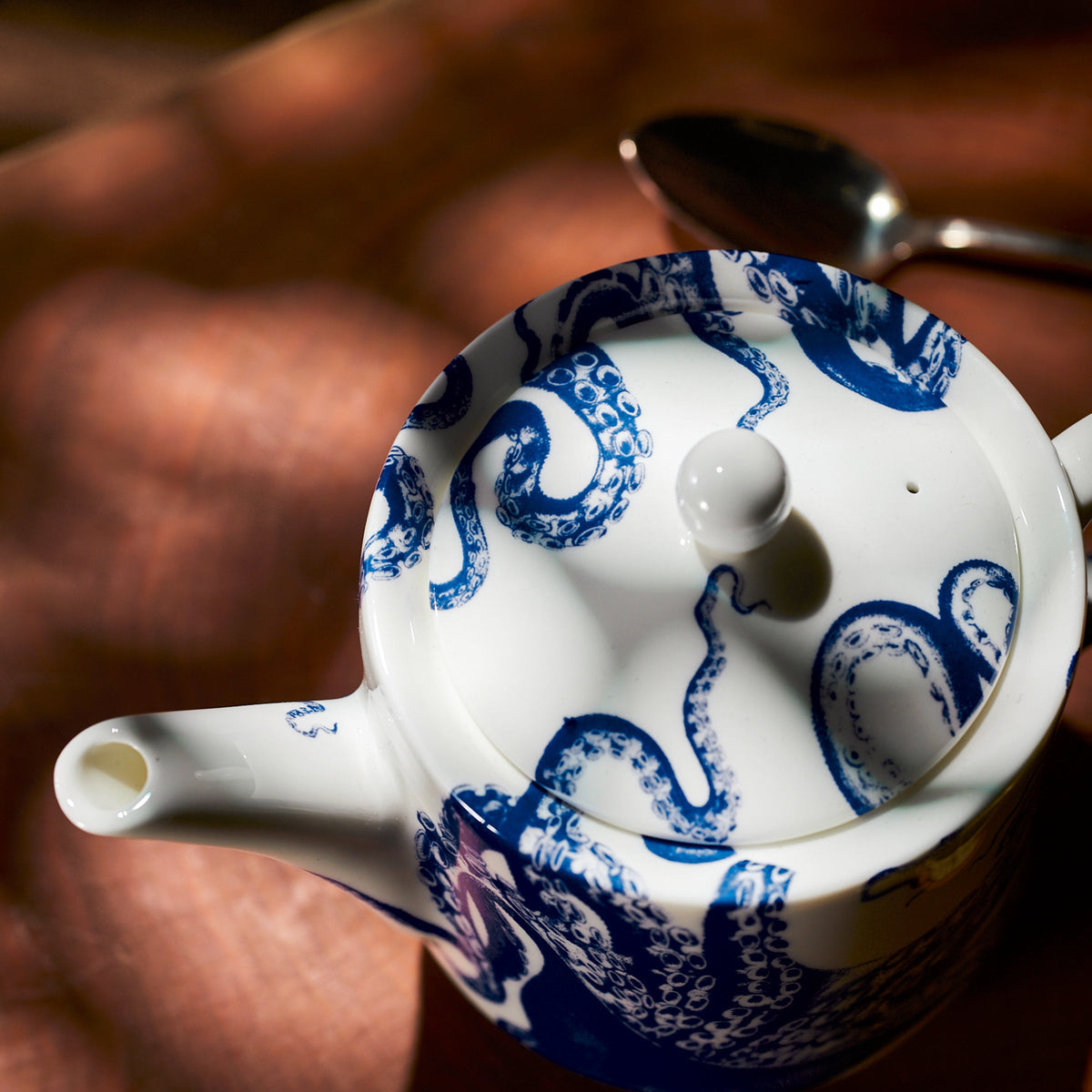 A Lucy Petite Teapot by Caskata with a deepwater whimsy octopus design.