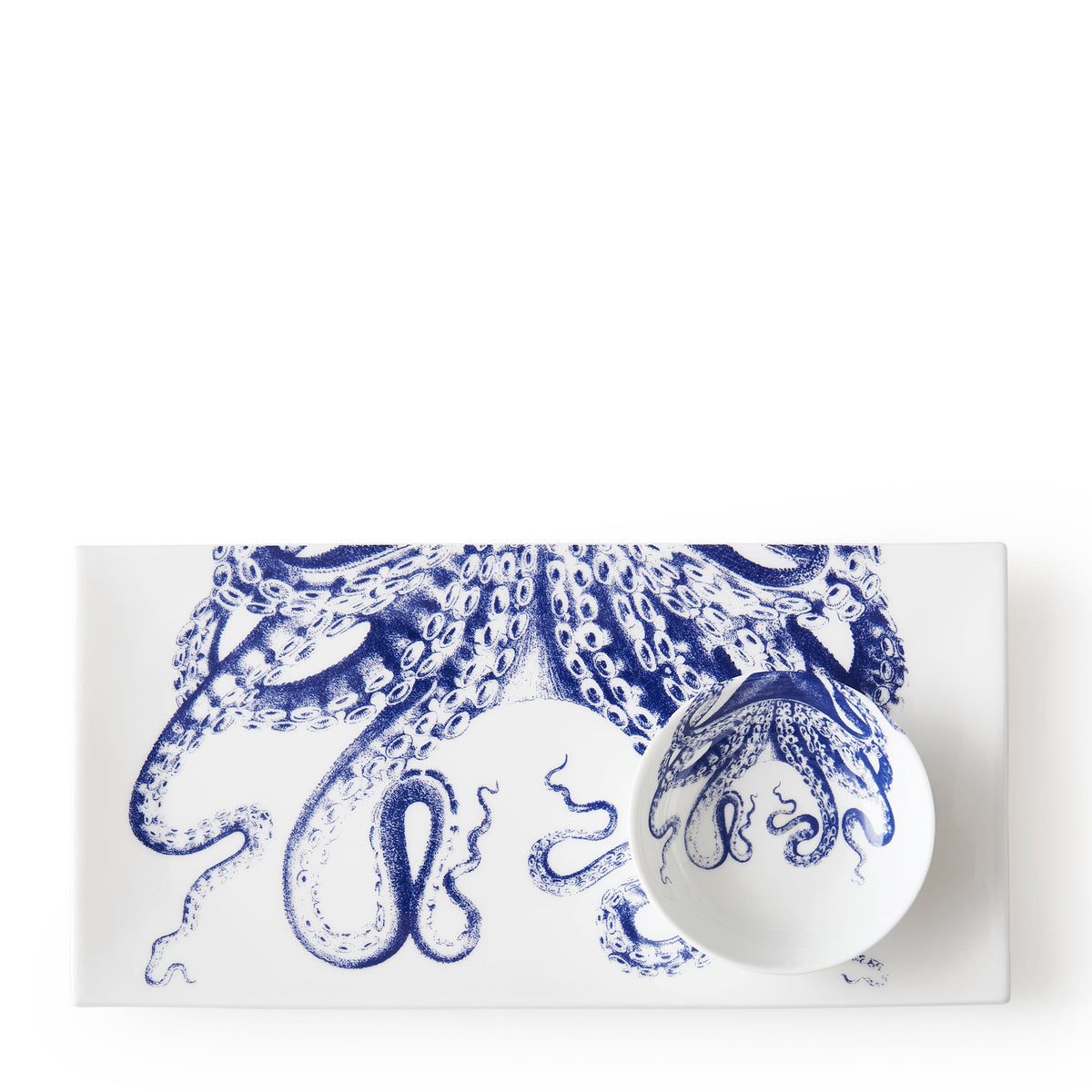 A Lucy Dipping Dish Set/4 by Caskata with a blue and white octopus design on it.