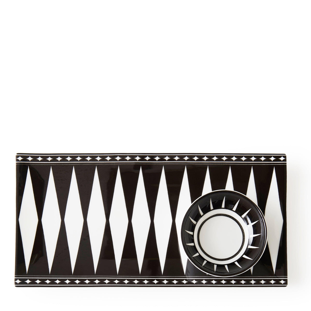 The Caskata Marrakech Petite Serving Tray features a rectangular black and white geometric design with an Art Deco flair, accompanied by a matching round bowl.