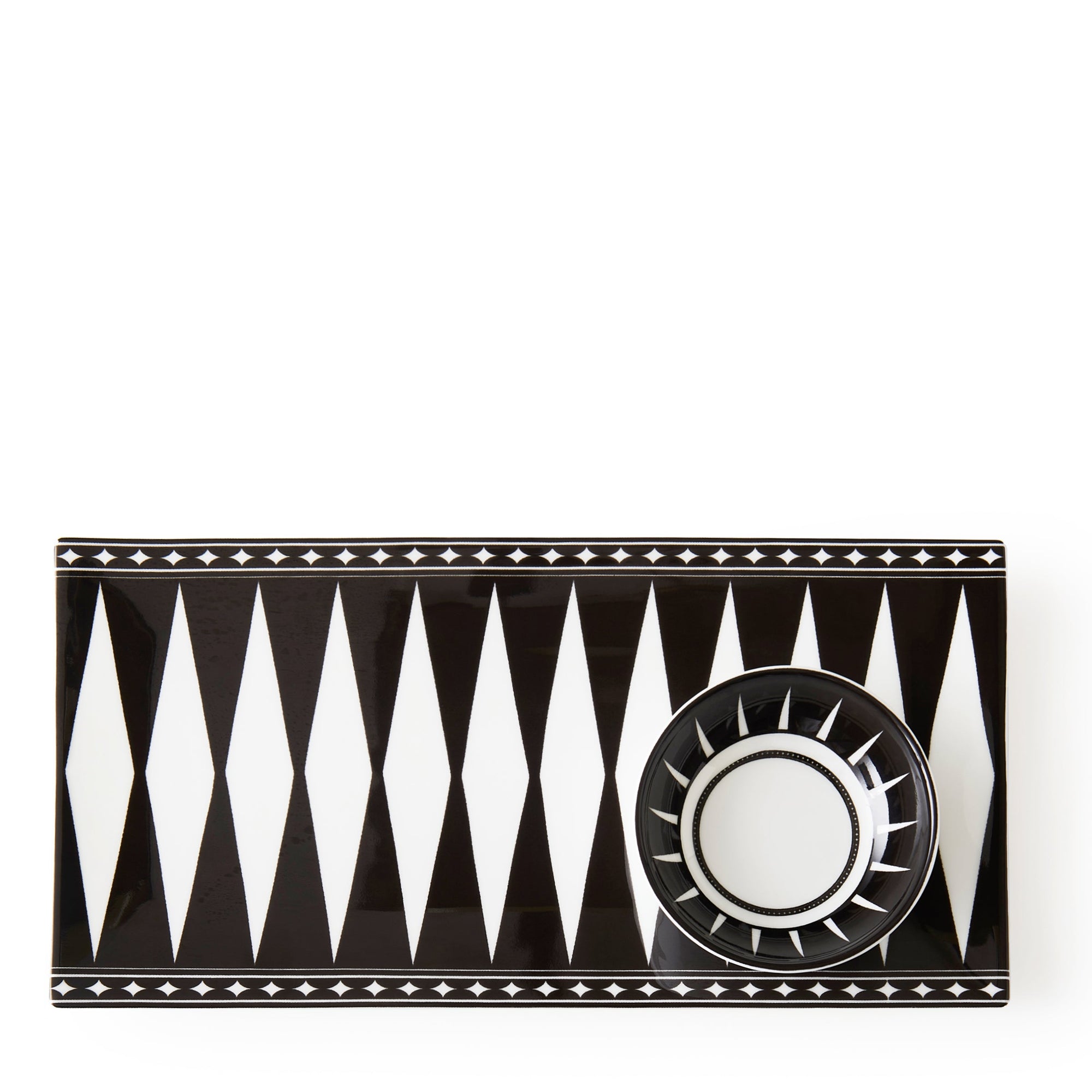 A rectangular bone china tray featuring a black and white geometric pattern with a diamond design along the center and a border of small triangles, perfect for serving appetizers, the Marrakech Large Sushi Tray by Caskata.