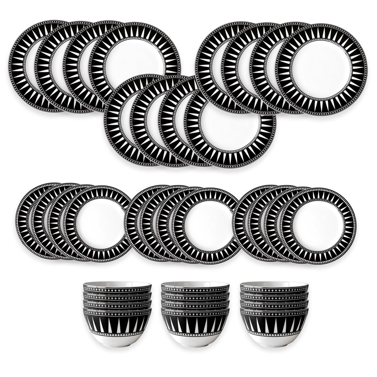 The Caskata Marrakech Table for 12 is a 24-piece dinnerware set featuring black and white geometric patterns, with plates, saucers, and matching cups arranged in rows.