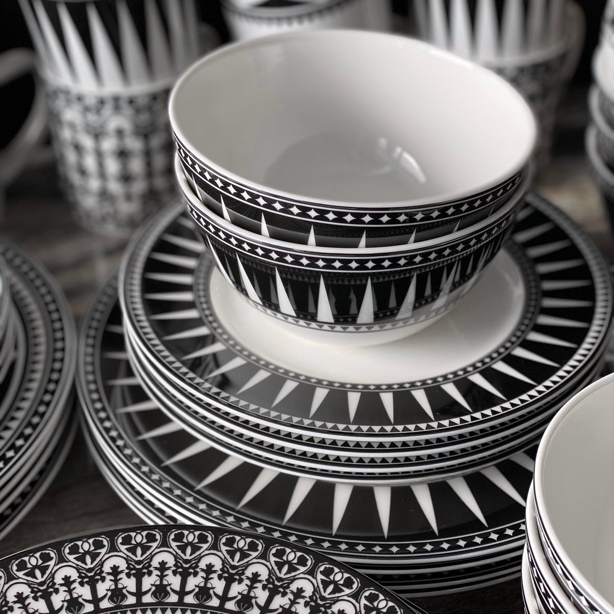 A set of Marrakech Tall Cereal Bowls by Caskata Artisanal Home on a table.