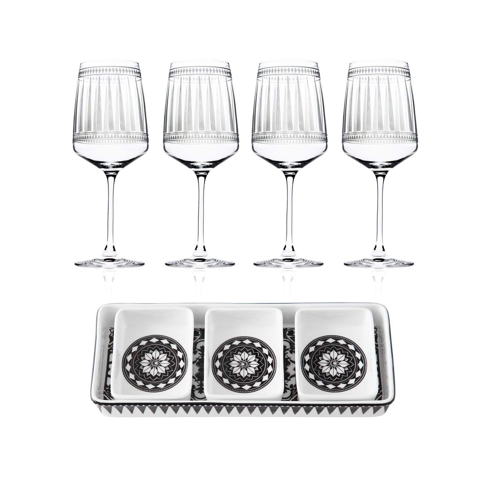 The "Cocktail Hour" Bundle by Caskata features four red wine glasses arranged above a rectangular appetizer tray with three small square dishes, each showcasing a striking black and white geometric design.