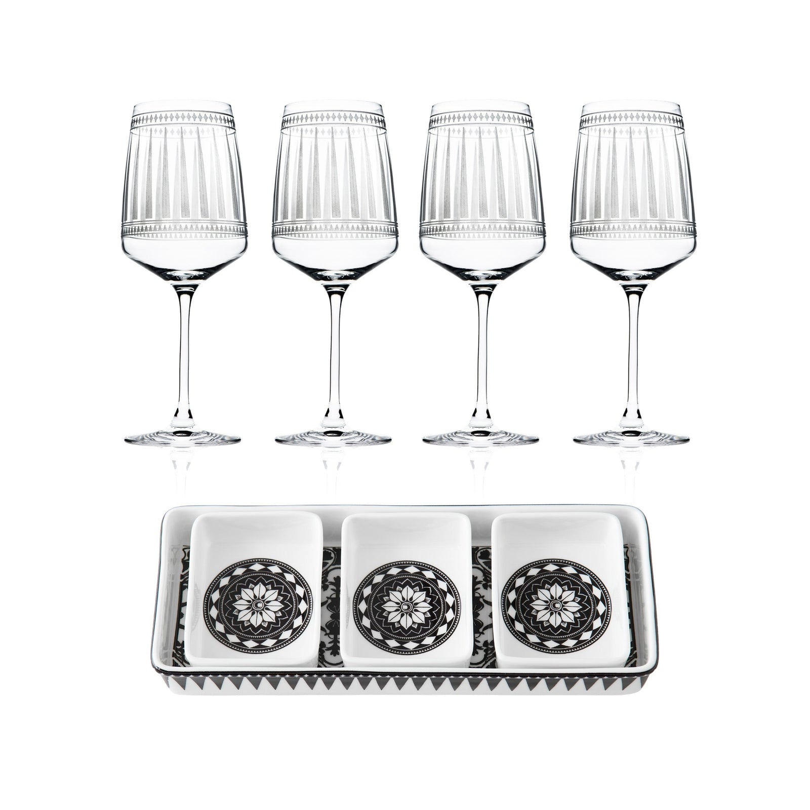 The Caskata Cocktail Hour Bundle includes four red wine glasses and a rectangular appetizer tray with three square dishes, each adorned with a black and white geometric design.