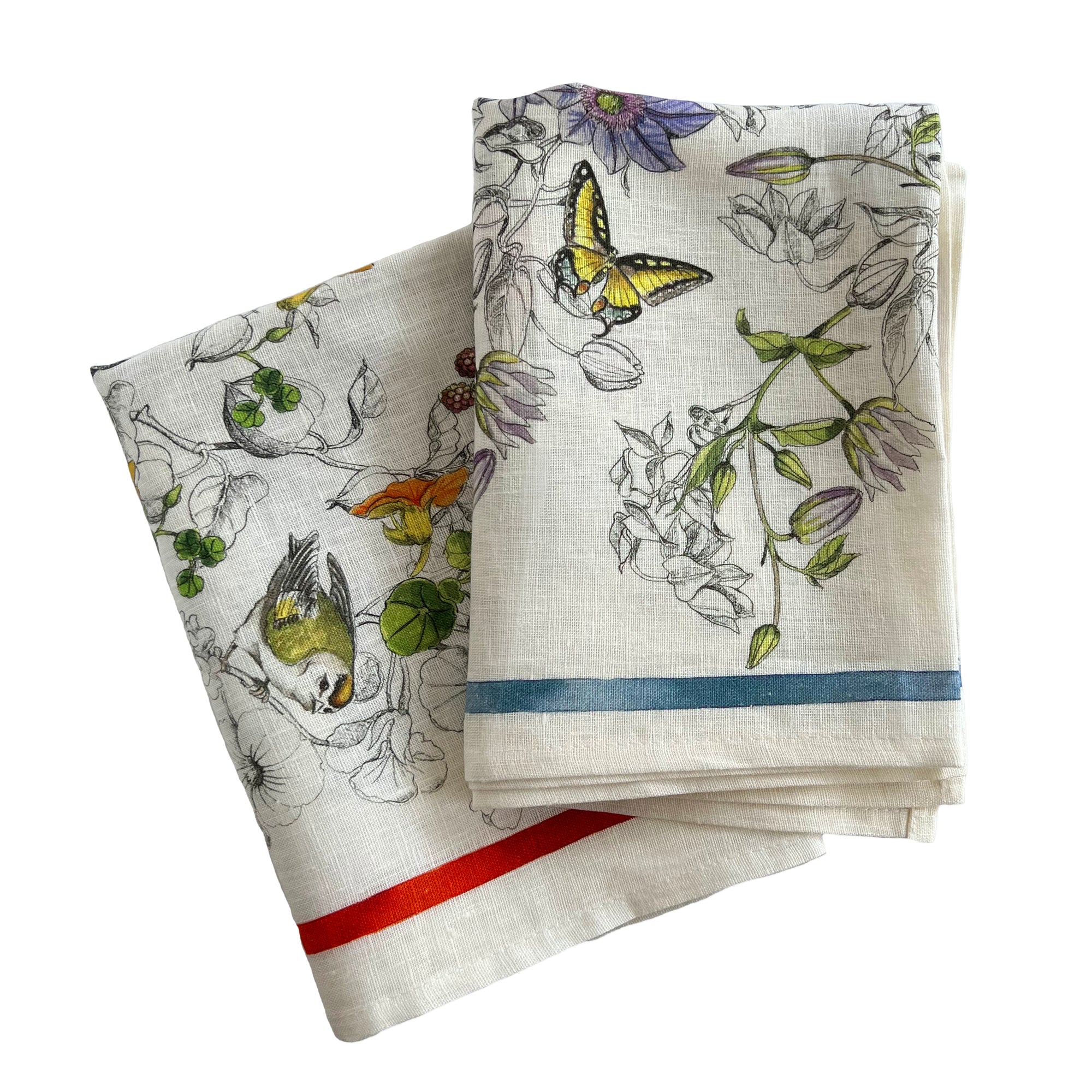 Nasturtiums playfully dance across this set of two, 100% linen kitchen towels from Caskata