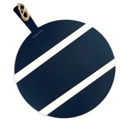 Oversized Round Charcuterie Serving Board in Navy with Contrasting White Stripes is made from reclaimed European Timbers, featuring one side with a textured finish and one side with a smooth finish, exclusively from Caskata. This image shows the striped side.