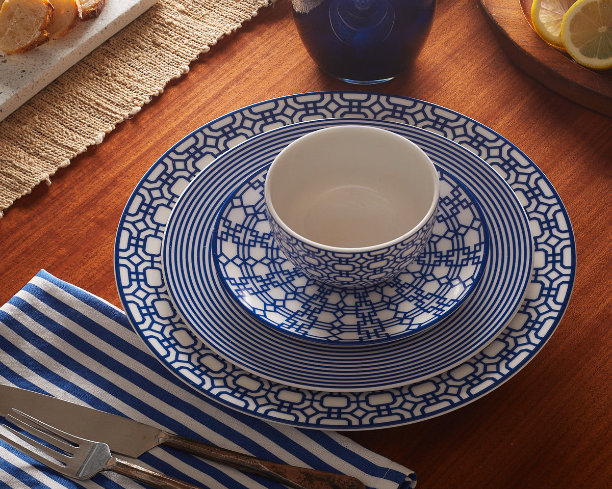 A blue and white Newport Snack Bowl with a geometric pattern, dishwasher safe by Caskata Artisanal Home.