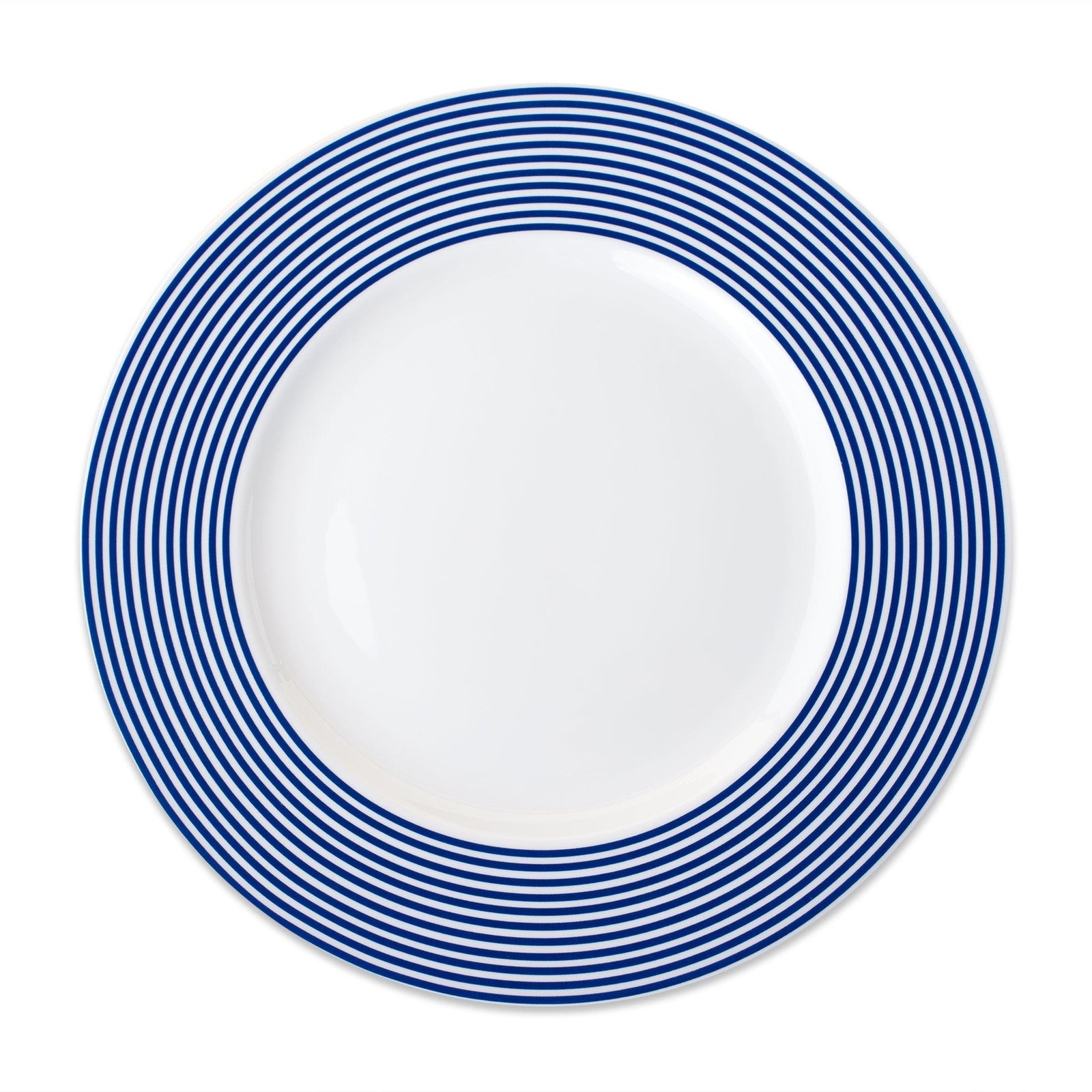 A white Newport Stripe Rimmed Dinner Plate by Caskata Artisanal Home with concentric blue circles around the edge, perfect for contemporary dinnerware collections.