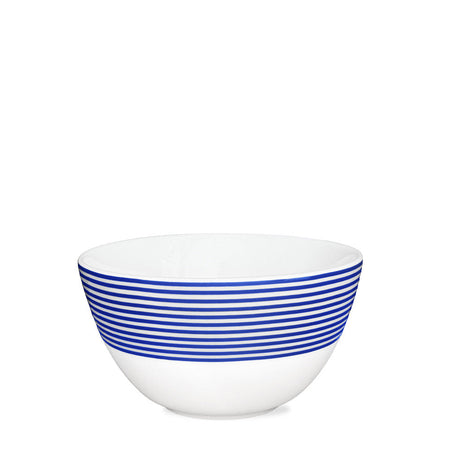 The Newport Stripe Cereal Bowl by Caskata Artisanal Home features premium white porcelain with multiple blue stripes near the rim, set against a classic white background.