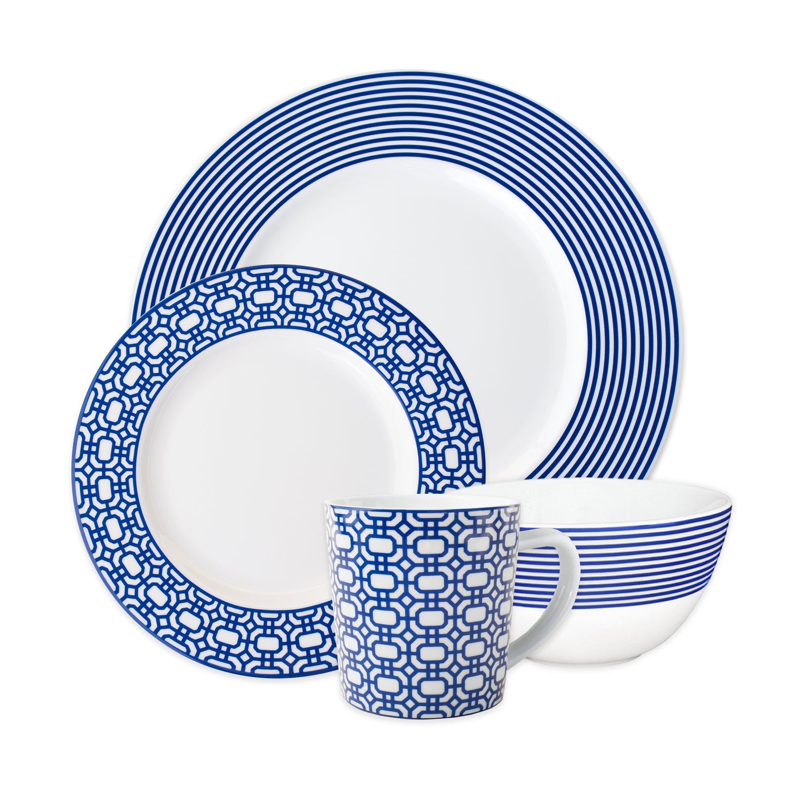 The Caskata Artisanal Home Newport 4-Piece Place Setting features a plate, salad plate, bowl, and mug with blue geometric patterns and stripes on white porcelain; dishwasher safe for easy cleaning.