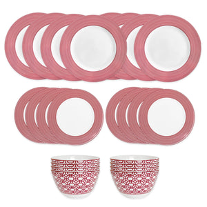 The Newport Crimson Stripe Table for 8 by Caskata features red and white porcelain plates with concentric circles and two matching cups, all neatly arranged on a white background.