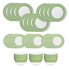 Caskata’s Newport Verde Table for 12 is a 36-piece premium porcelain dinnerware set with white plates, salad plates, and bowls featuring elegant green patterned rims arranged on a crisp white background.
