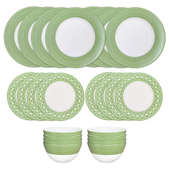 The Caskata Newport Verde Table for 8 is a 16-piece green and white porcelain dinnerware set with striped and patterned plates and bowls, perfect for stylish dining.