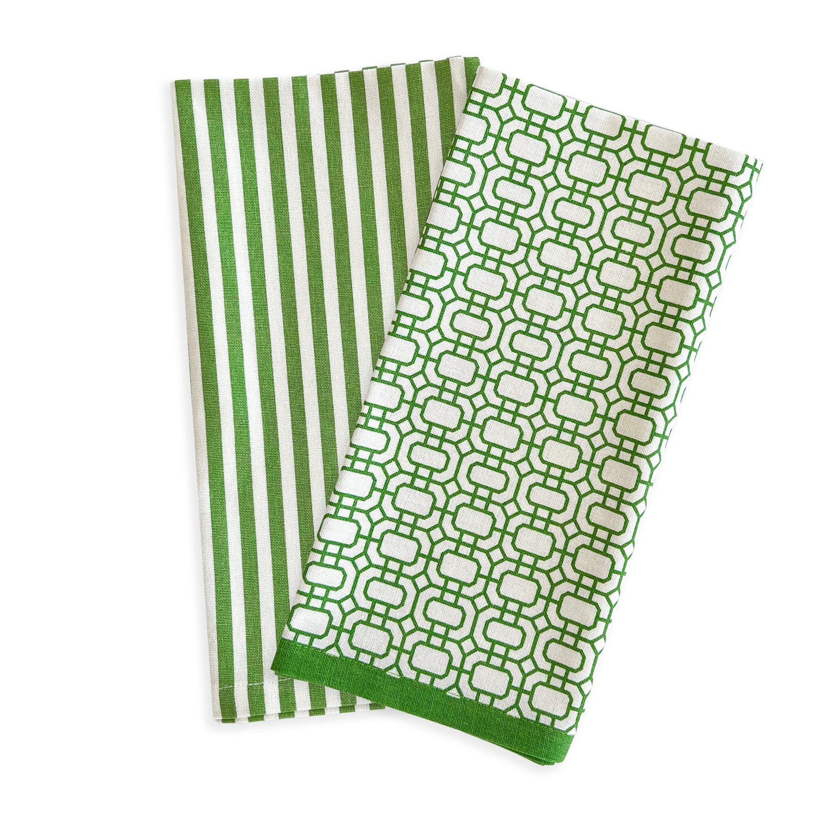 Two cotton tea towels, one with vertical stripes and the other with a geometric pattern, are folded next to each other—perfect kitchen companions inspired by the charm of Newport Garden Gate & Pinstripe Verde Kitchen Towels, Mixed Set of 2 from Caskata.