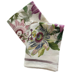 Passionflowers depicted in vivid watercolors on this set of 2 kitchen towels, made of 100% Italian linen, sold by Caskata