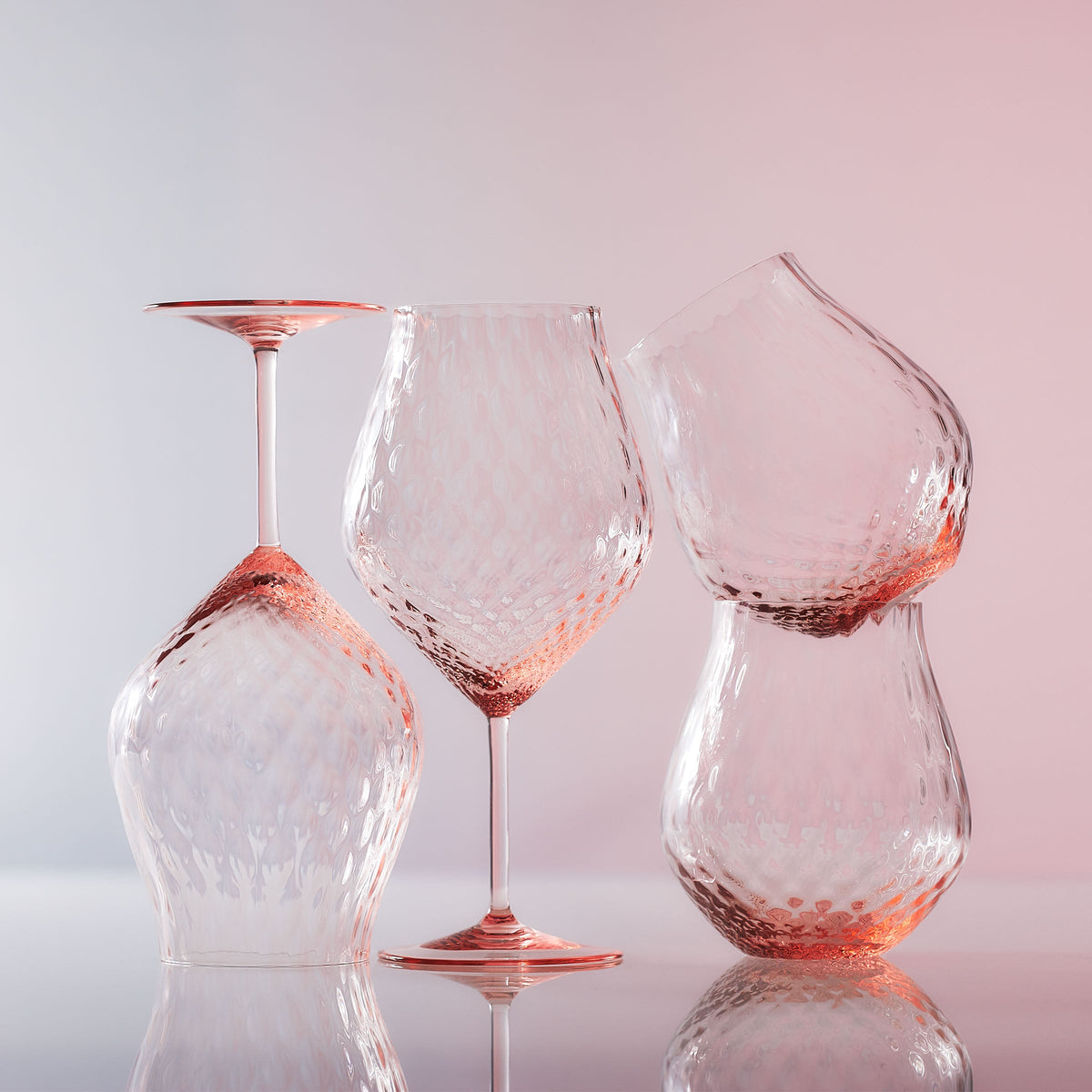 Phoebe rose pink mouth-blown optic crystal universal wine glasses from Caskata.