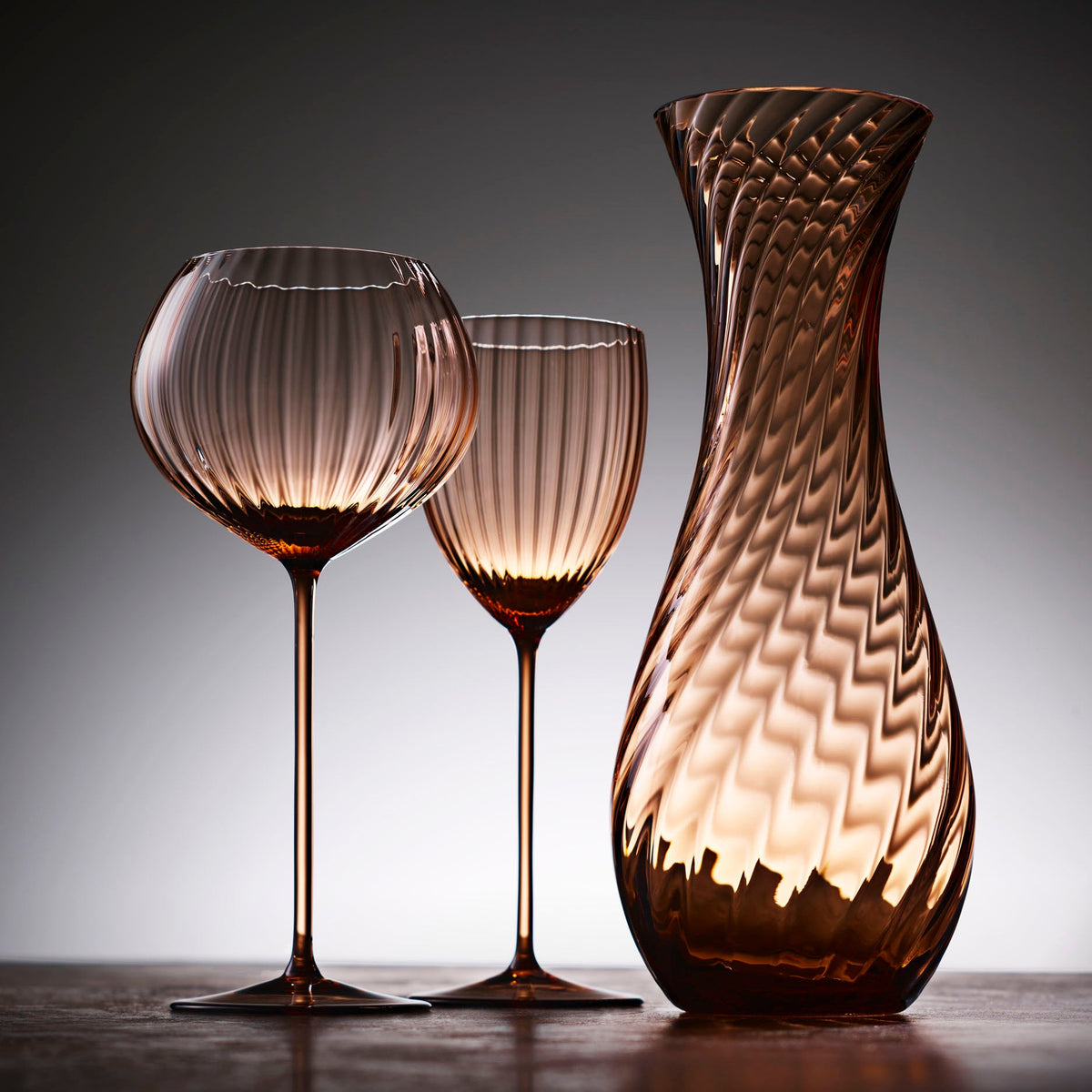 Quinn Stemware Red Wine Glass and White Wine Glass and Carafe in Amber from Caskata