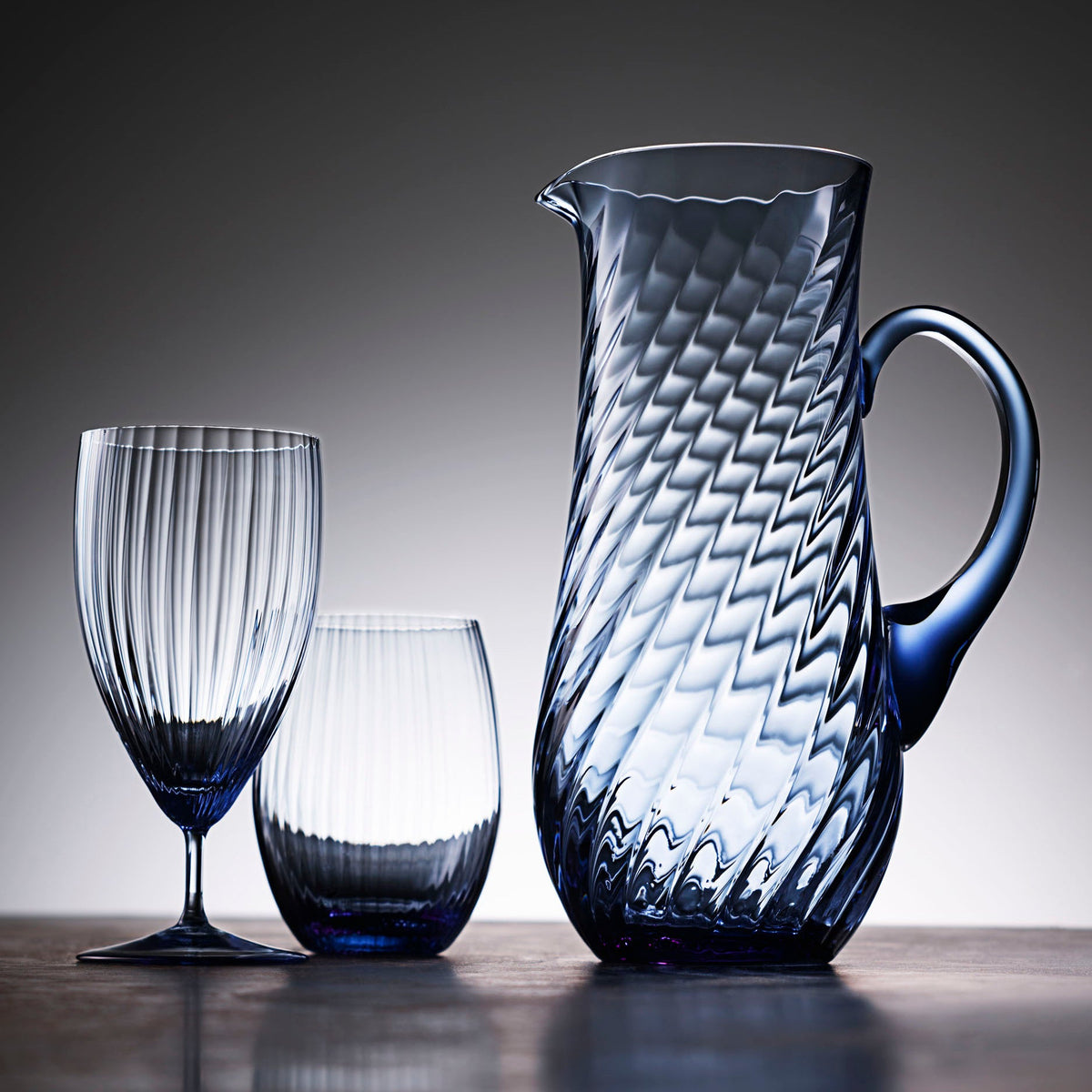 Quinn Stemware Everyday Glass and Tumbler and Pitcher in Ocean from Caskata