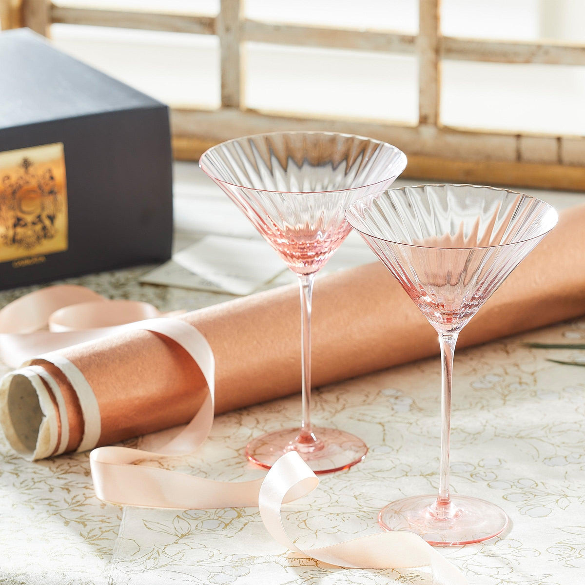 Quinn rose pink mouth-blown crystal martini glasses from Caskata.