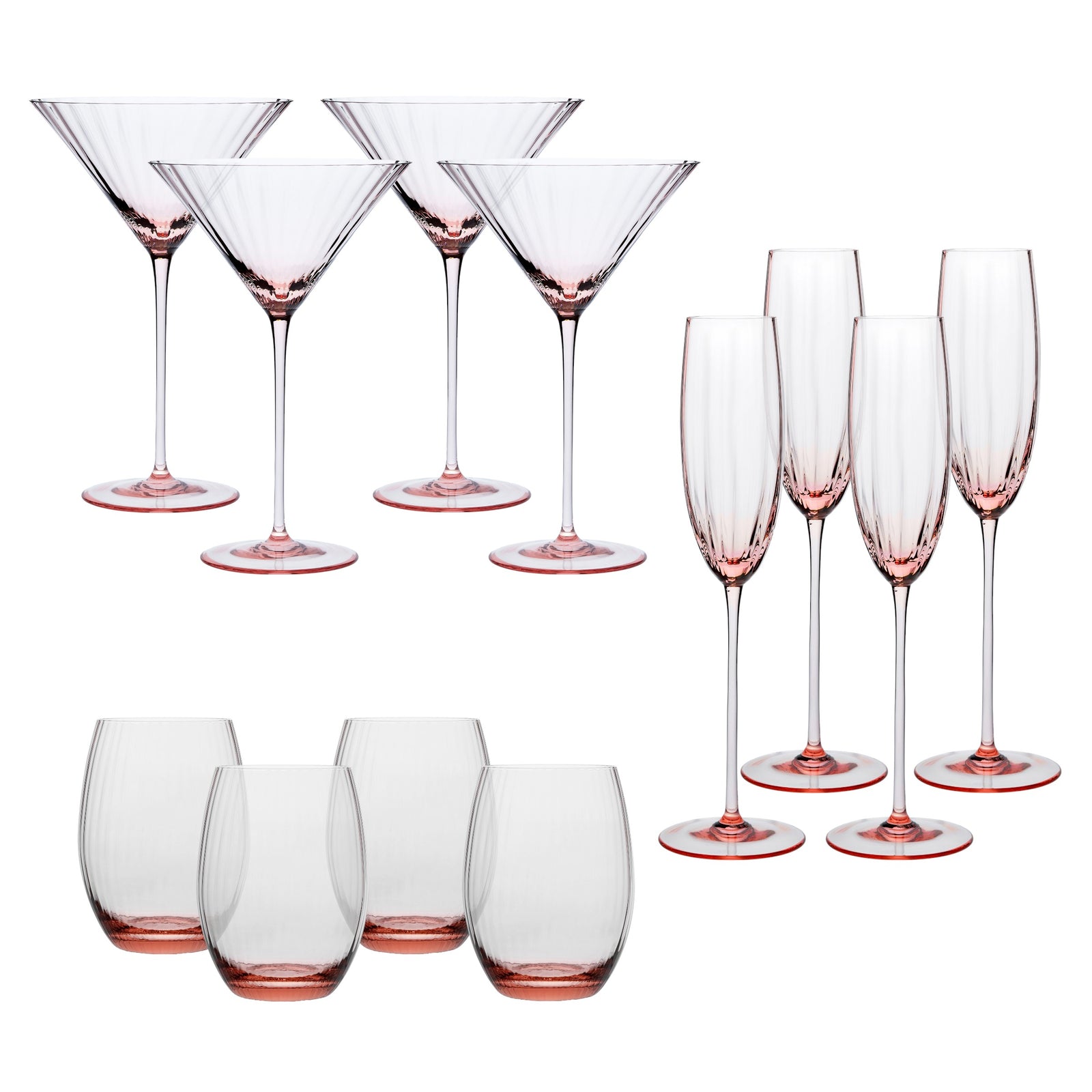 The Quinn Rose Cocktail Set by Caskata features 12 rose pink Czech glass pieces: 4 martini glasses, 4 champagne flutes, and 4 stemless wine glasses—each with a pink-tinted base on a white background.