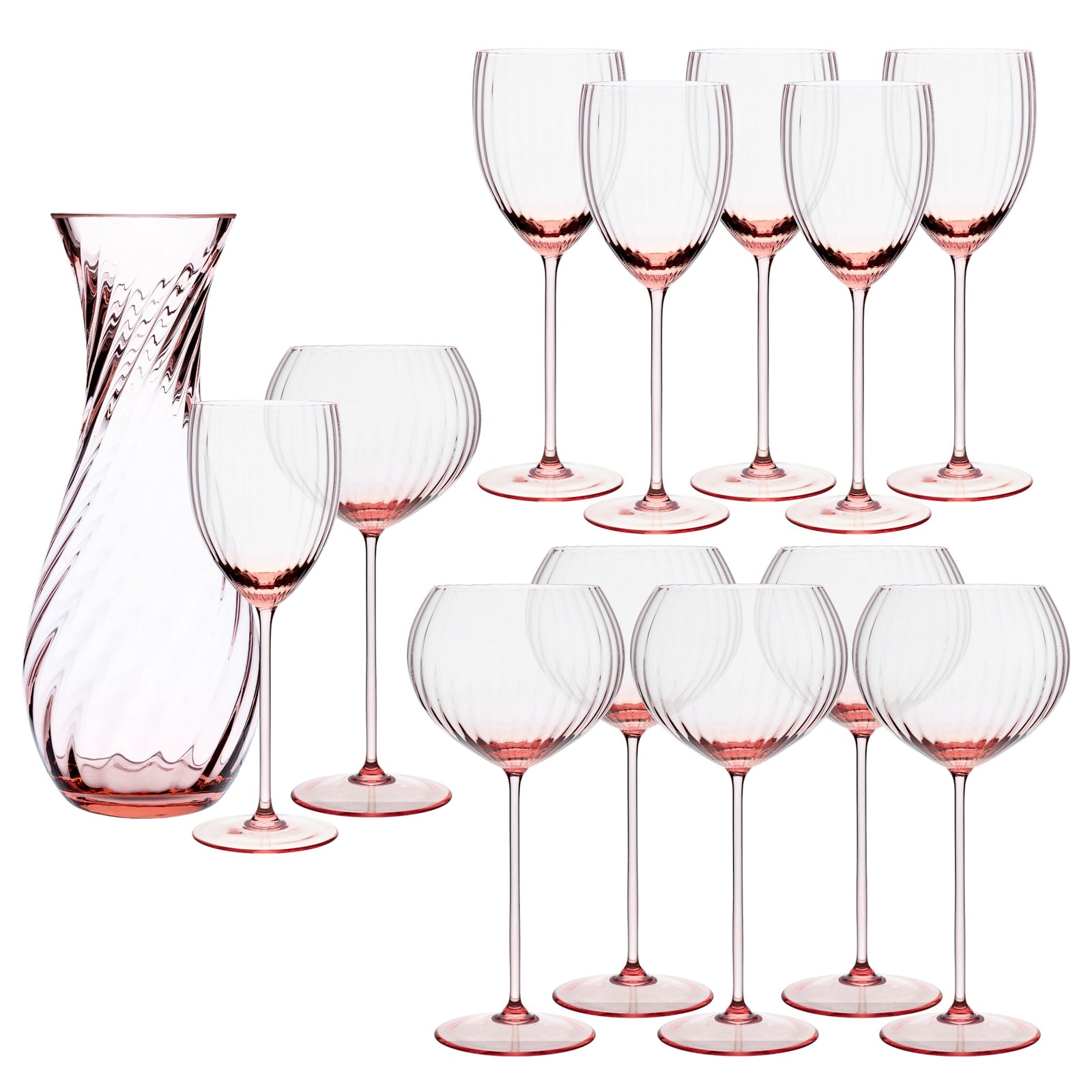 The Quinn Rose Wine Lovers Set by Caskata includes nine pink-tinted crystal wine glasses, two wide-bowl glasses, and a matching carafe, all featuring a textured swirl pattern.