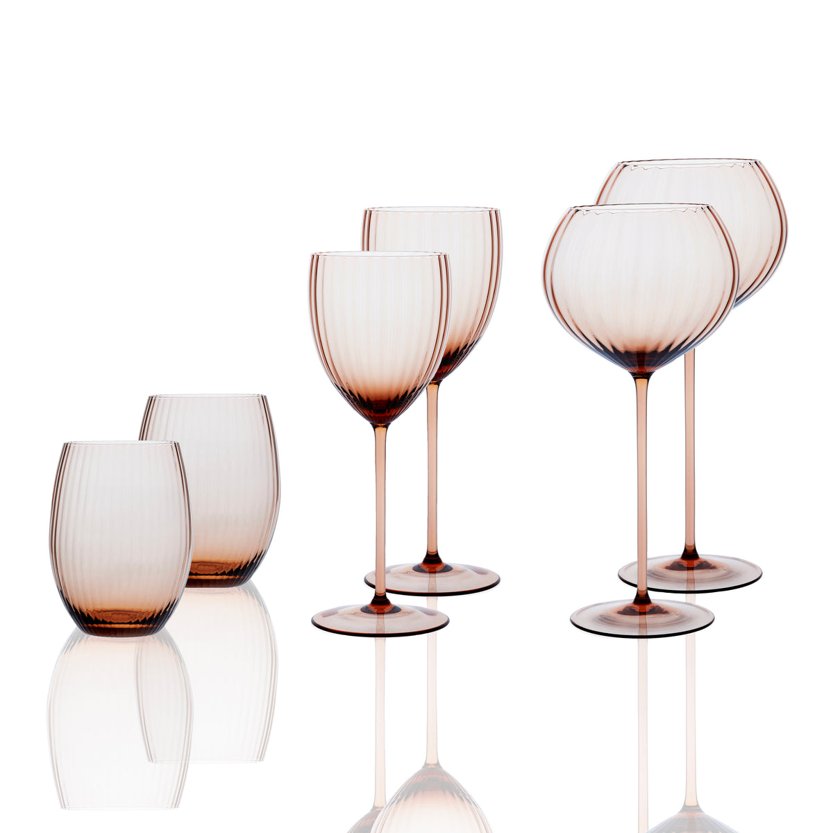 Quinn Amber Mouth-Blown Crystal Wineglass Starter Set featuring 2 red wine balloon glasses, 2 white wine stemmed glasses, and 2 stemless wine glasses from Caskata