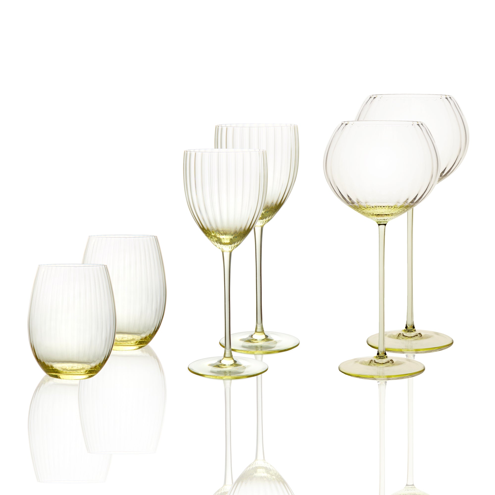 Quinn Starter Set- mouth-blown crystal wine collection includes 2 red wine balloon stems, 2 white wine stems, and 2 stemless glasses in delicate Citrine yellow from Caskata