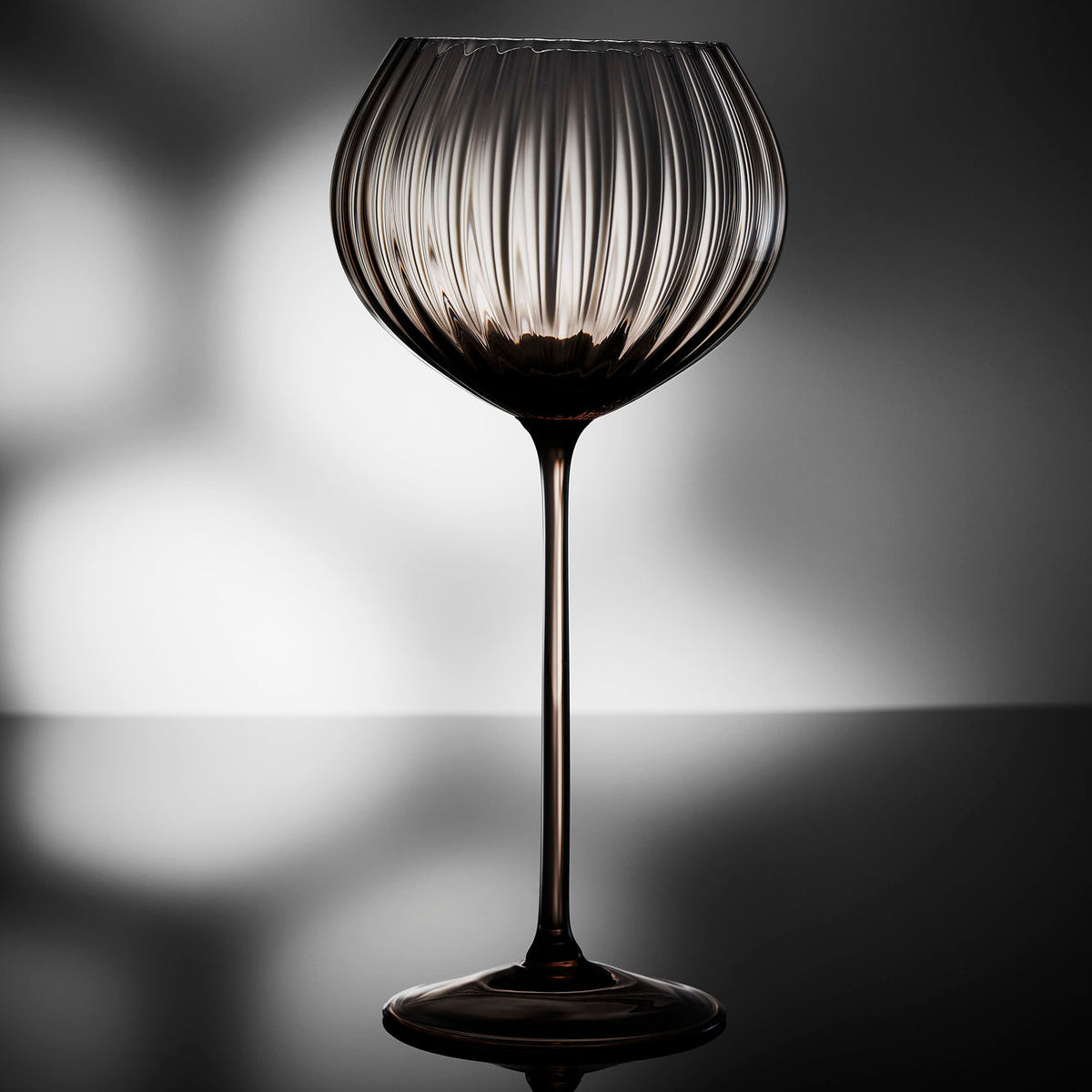 Moody and Romantic photo of quinn mocha red wine glass by Caskata