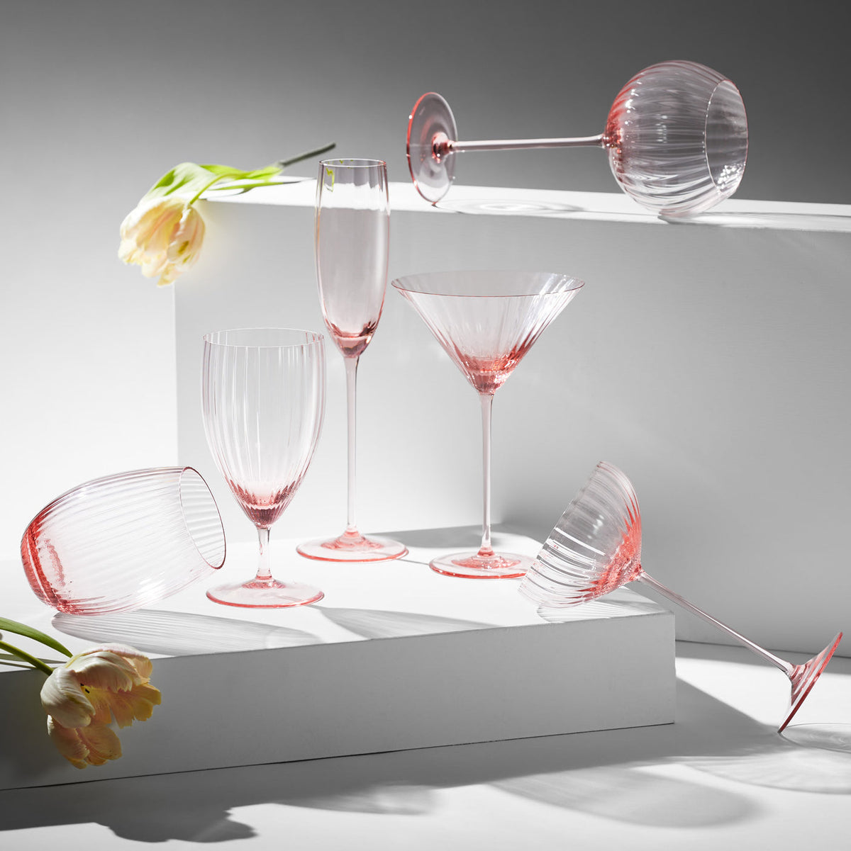 Quinn rose pink mouth-blown crystal martini glasses from Caskata.