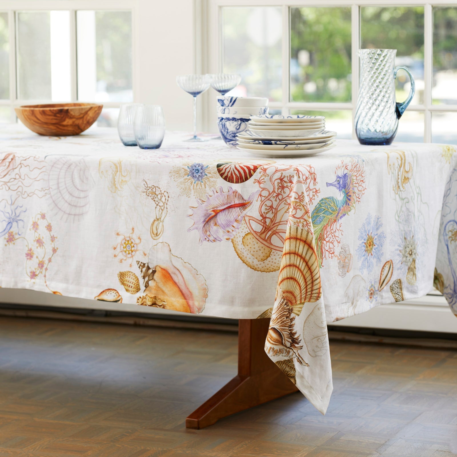 Graphic Tablecloth Print with jellyfish, seahorses and shells in bright watercolors on Italian linen from Caskata