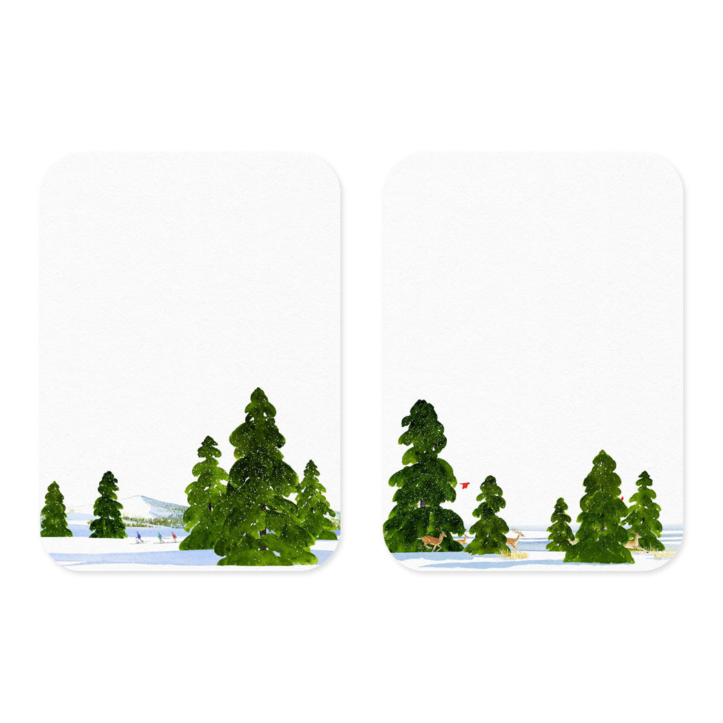 Two small Caskata X Felix Doolittle Winter Note Card Sets with a snowy landscape and trees.