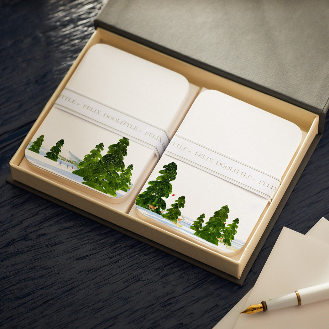 A bespoke collection of Caskata X Felix Doolittle Winter Note Card Sets, including a pen, elegantly presented in a box.