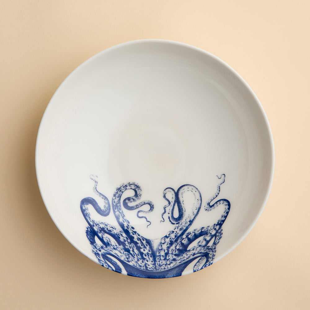 Lucy the Octopus warps around this entree bowl in creamy white porcelain from Caskata. In blue and white, it's perfect for soups, stews, salads or serving.