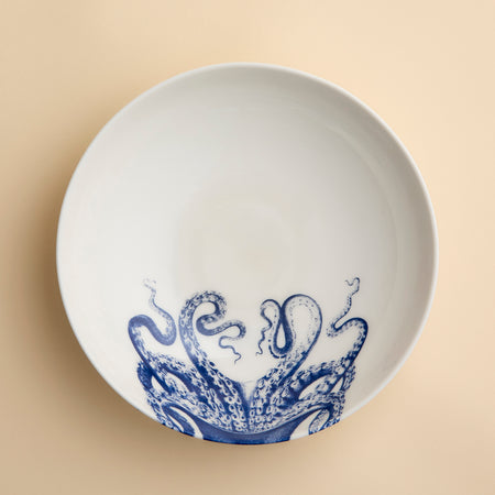 Lucy the Octopus warps around this entree bowl in creamy white porcelain from Caskata. In blue and white, it's perfect for soups, stews, salads or serving.